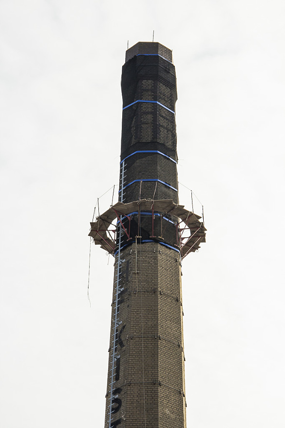Chimney of the former sand-lime brick factory remains intact